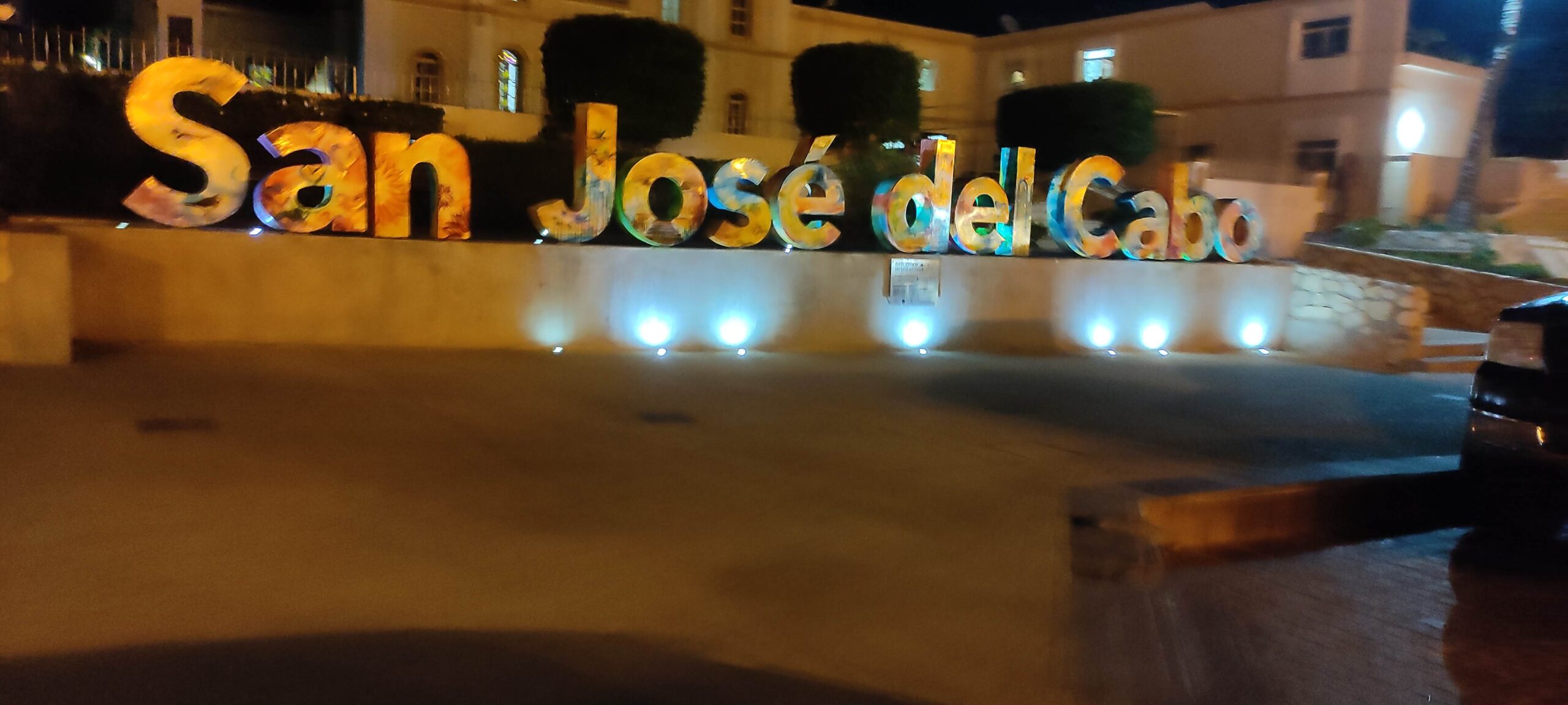 San José del Cabo sign illuminated at night in the historic center